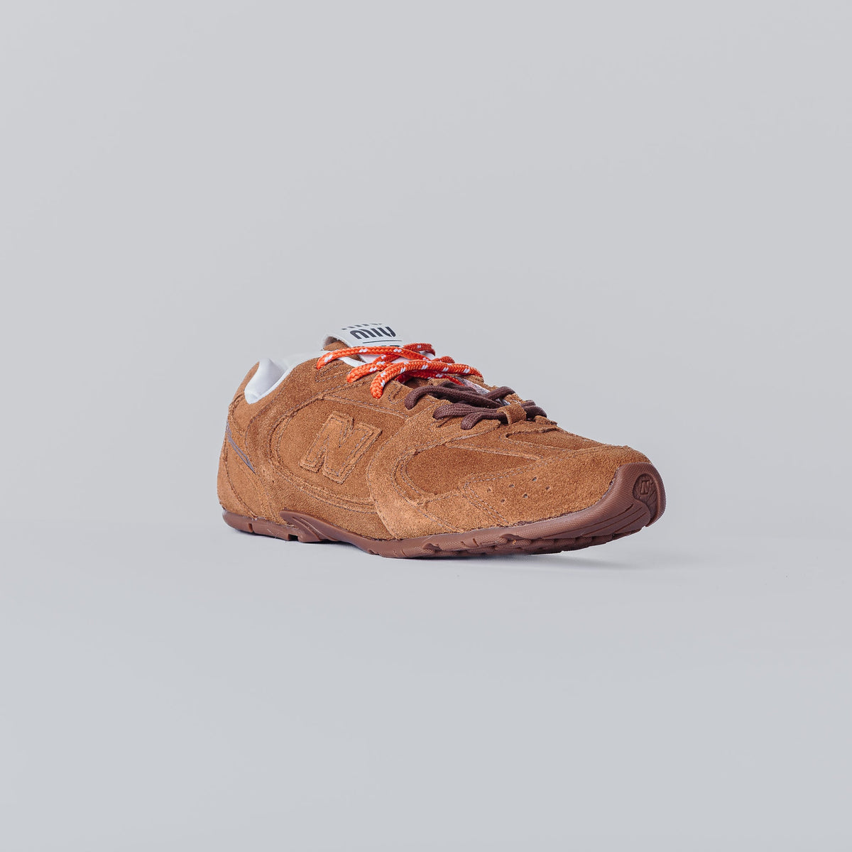 NB X Miu Miu 530 Marrom (SUPERLIVE)